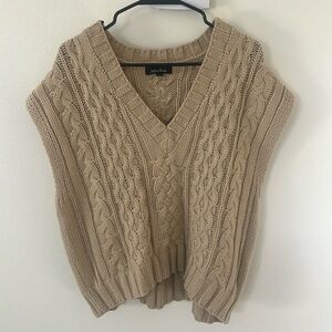 Oversized sweater vest from Anthropologie.